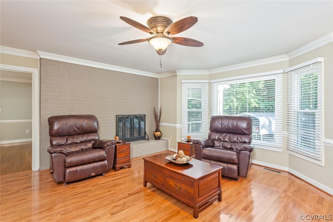 5710 Deep Forest Road Richmond, VA 23237 - Photo 20 of 40 a living room with furniture rug and window