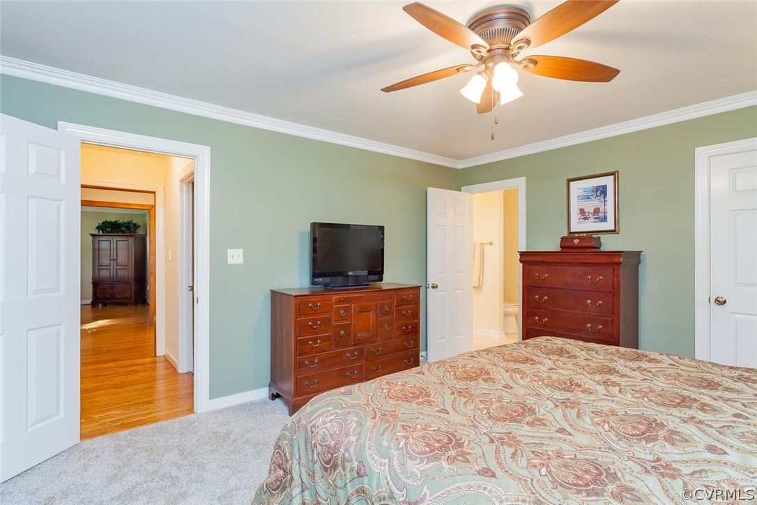 5710 Deep Forest Road Richmond, VA 23237 - Photo 28 of 40 a bedroom with a bed and a television