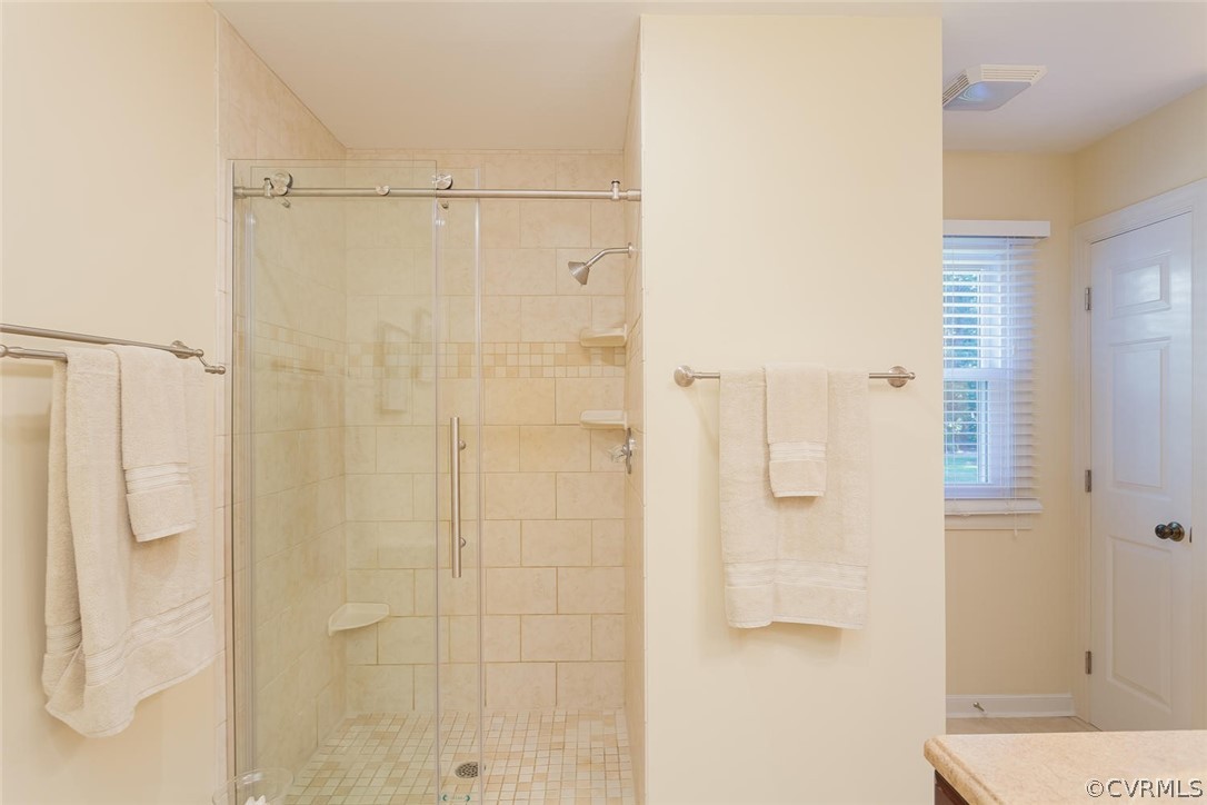5710 Deep Forest Road Richmond, VA 23237 - Photo 31 of 40 a bathroom with a shower
