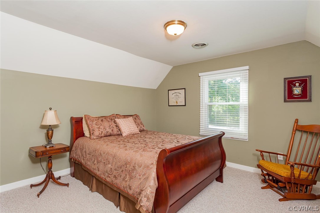 5710 Deep Forest Road Richmond, VA 23237 - Photo 33 of 40 a bedroom with a bed and a window