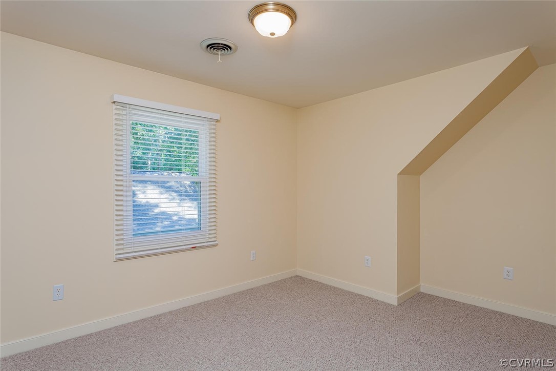 5710 Deep Forest Road Richmond, VA 23237 - Photo 36 of 40 an empty room with windows