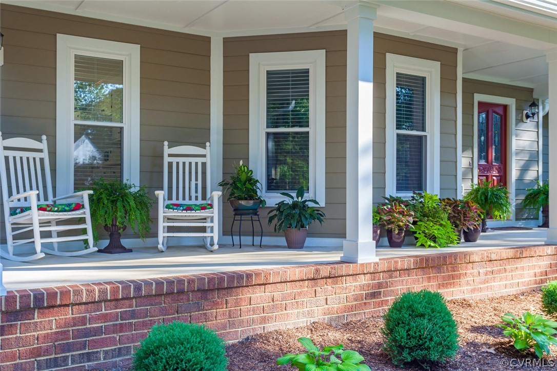 5710 Deep Forest Road Richmond, VA 23237 - Photo 5 of 40 front view of a house with potted plants