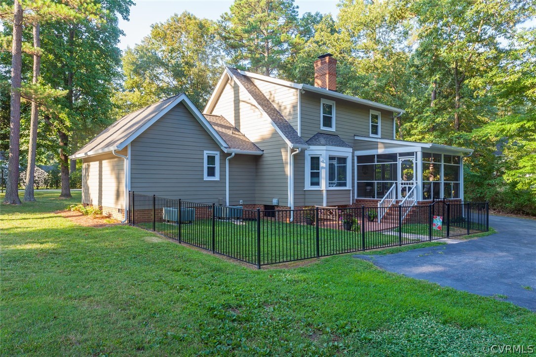 5710 Deep Forest Road Richmond, VA 23237 - Photo 8 of 40 a view of an house with backyard and porch