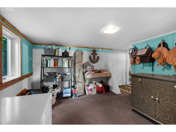 a bedroom with furniture and a bed