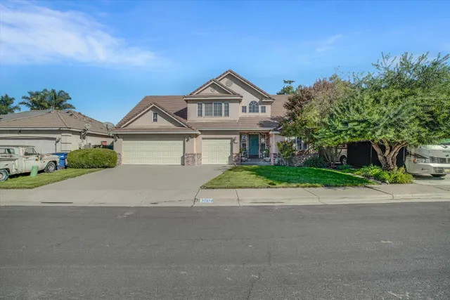 a view of a house with a street