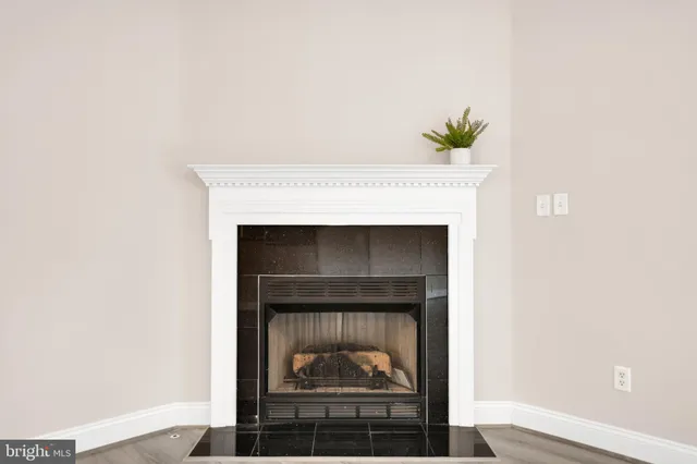 a hallway with a fireplace