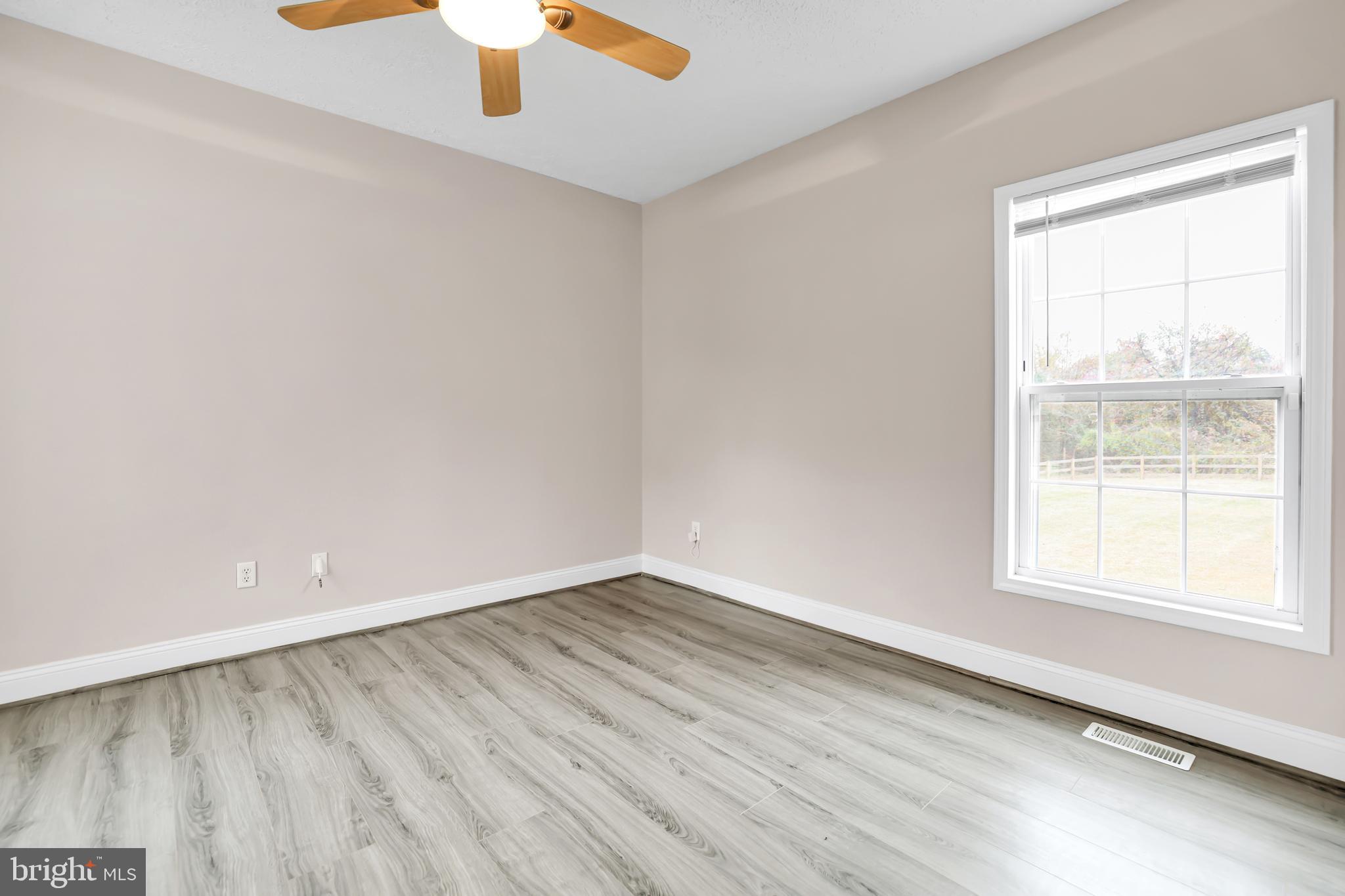 10717 Mt Sharon Road Orange, VA 22960 - Photo 15 of 35 an empty room with a window