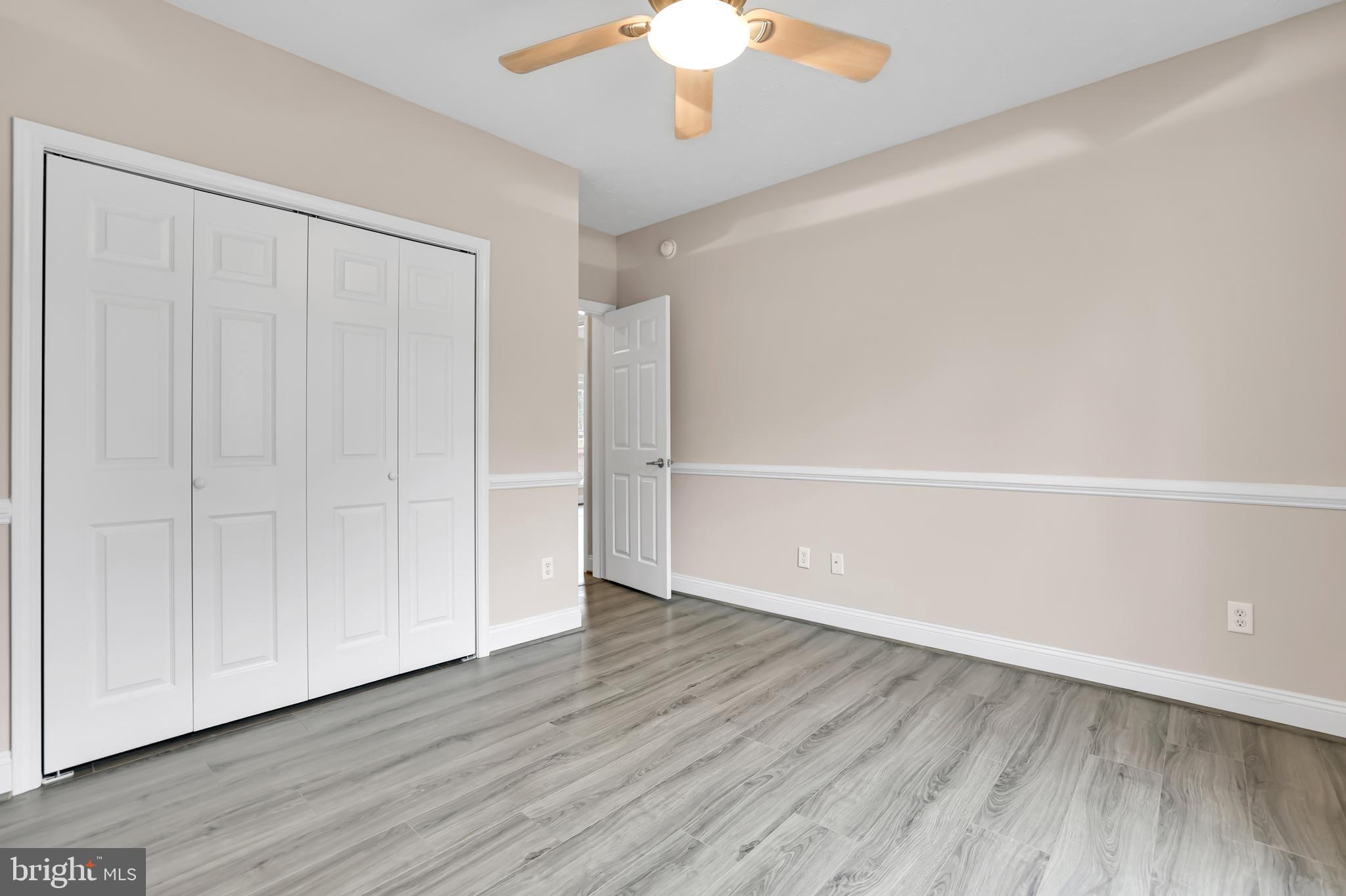 10717 Mt Sharon Road Orange, VA 22960 - Photo 18 of 35 a view of an empty room with wooden floor