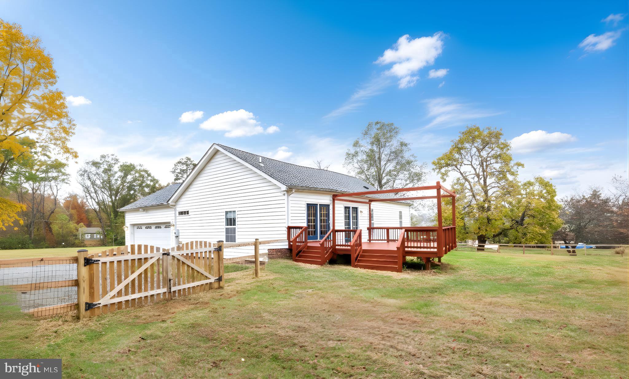 10717 Mt Sharon Road Orange, VA 22960 - Photo 3 of 35 a view of a house with a backyard