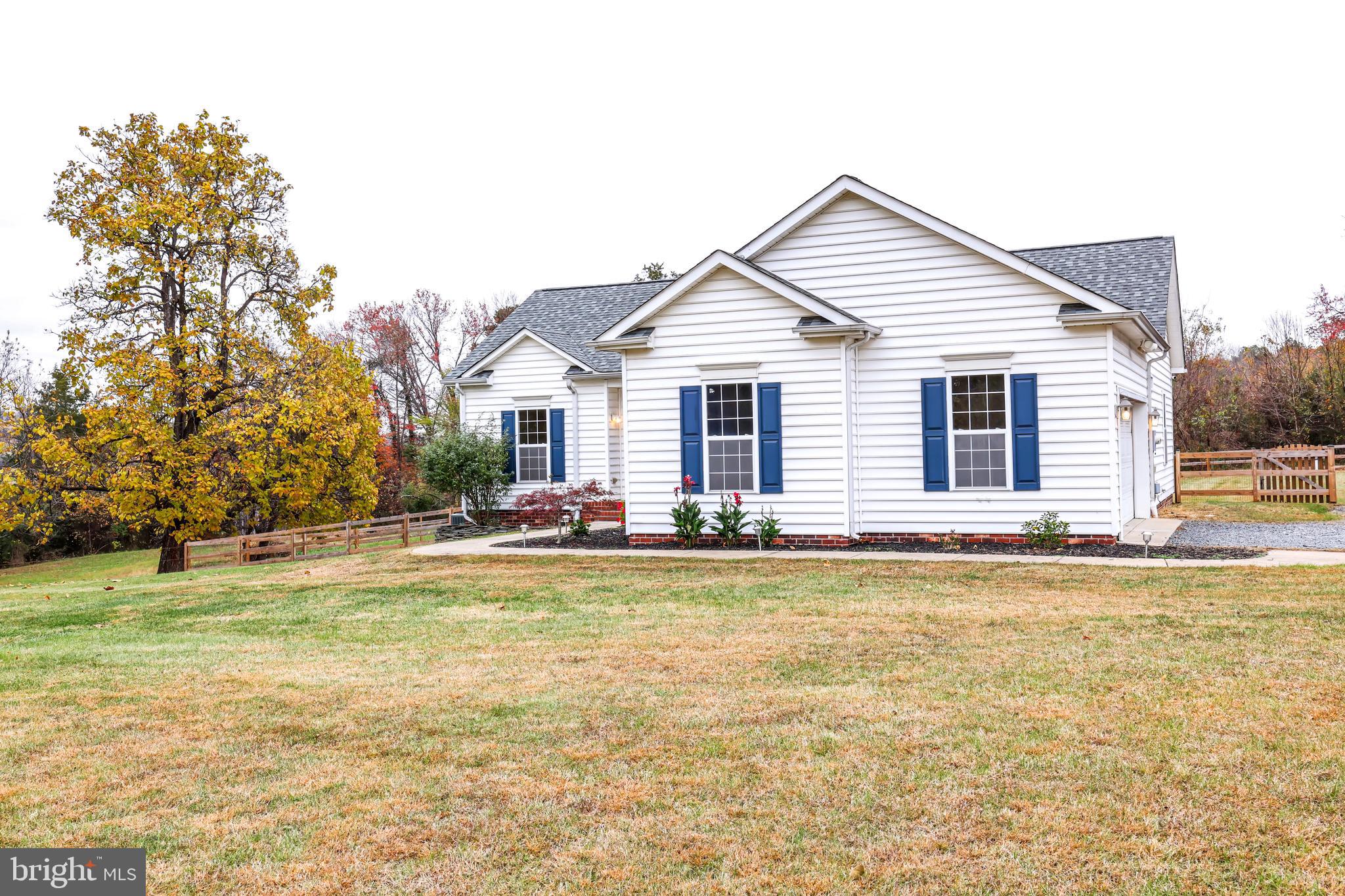10717 Mt Sharon Road Orange, VA 22960 - Photo 34 of 35 a view of a house with a yard and sitting area