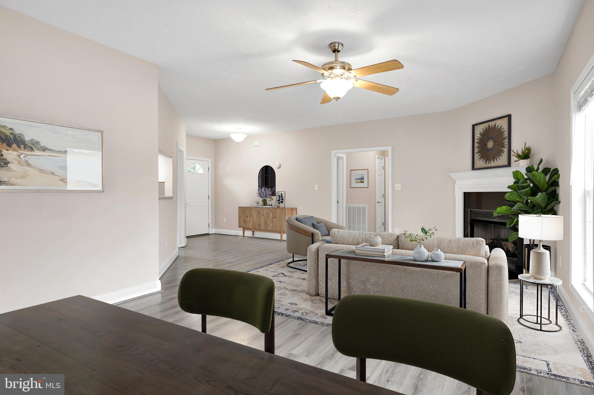 10717 Mt Sharon Road Orange, VA 22960 - Photo 5 of 35 a living room with furniture potted plant and a lamp
