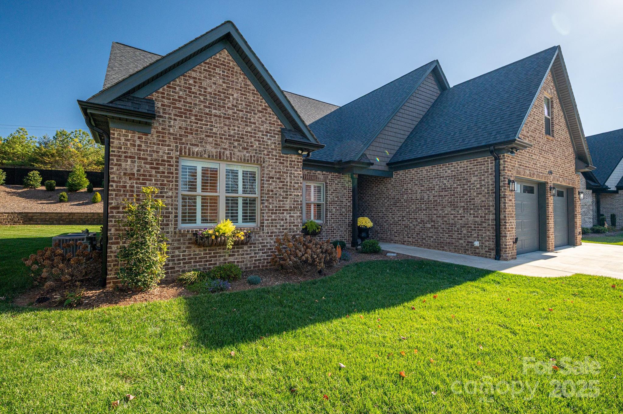 4290 Holly Circle Northeast Conover, NC 28613 - Photo 2 of 48 a front view of a house with garden