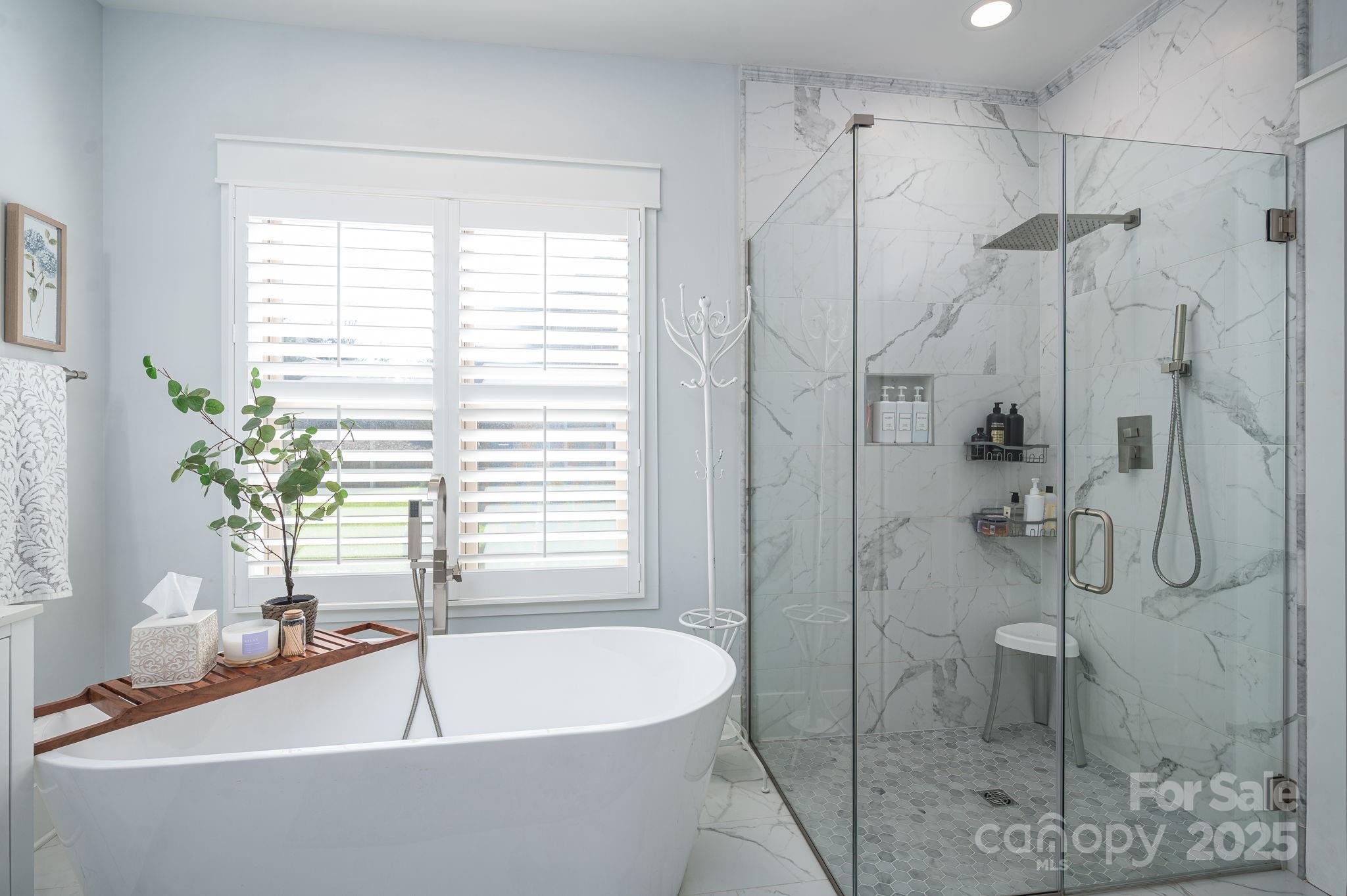 4290 Holly Circle Northeast Conover, NC 28613 - Photo 22 of 48 a white bath tub sitting next to a blue shower