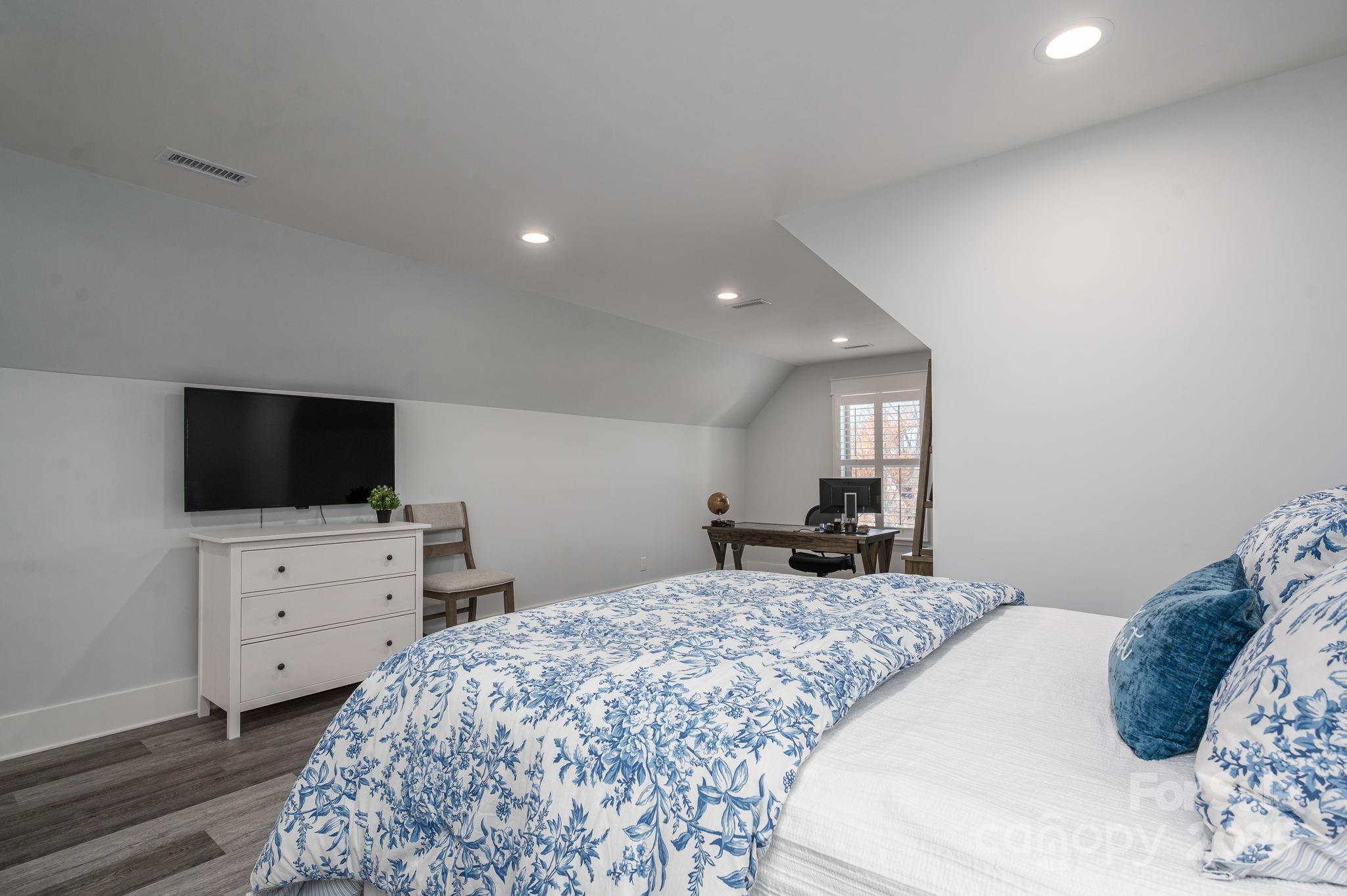 4290 Holly Circle Northeast Conover, NC 28613 - Photo 31 of 48 a bedroom with a bed and flat screen tv