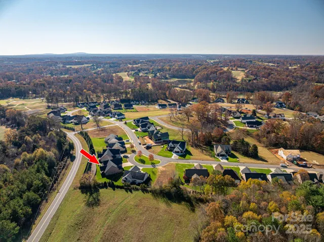 an aerial view of a city with lots of residential buildings