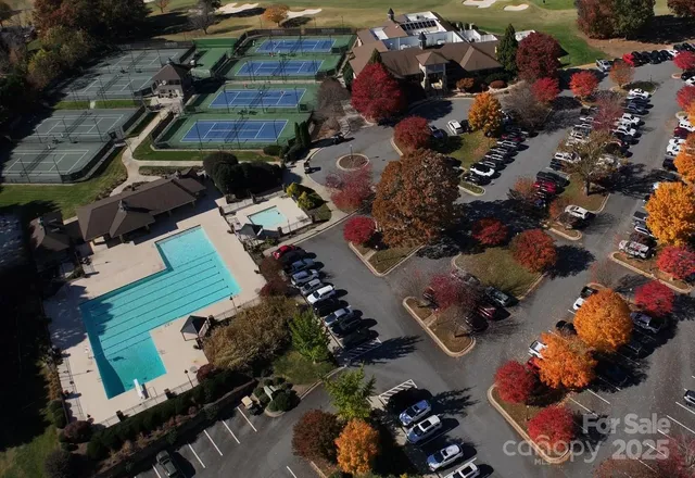 an aerial view of multiple houses with outdoor space