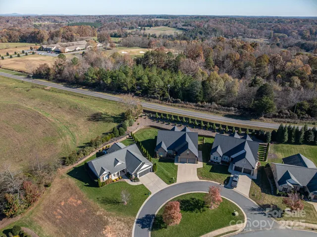 an aerial view of a house having yard