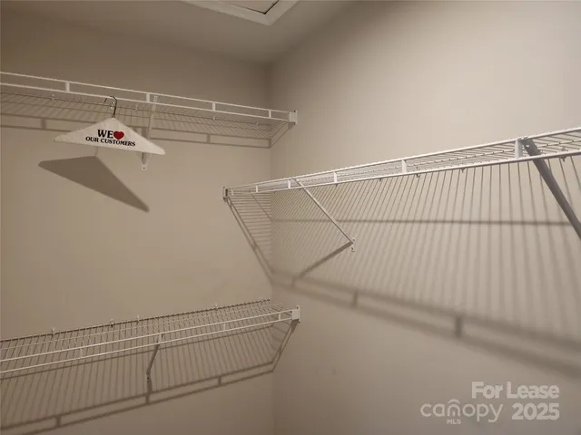 a view of a room with racks on the wall