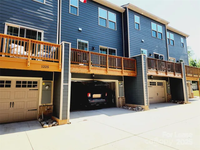 a view of a building with a garage