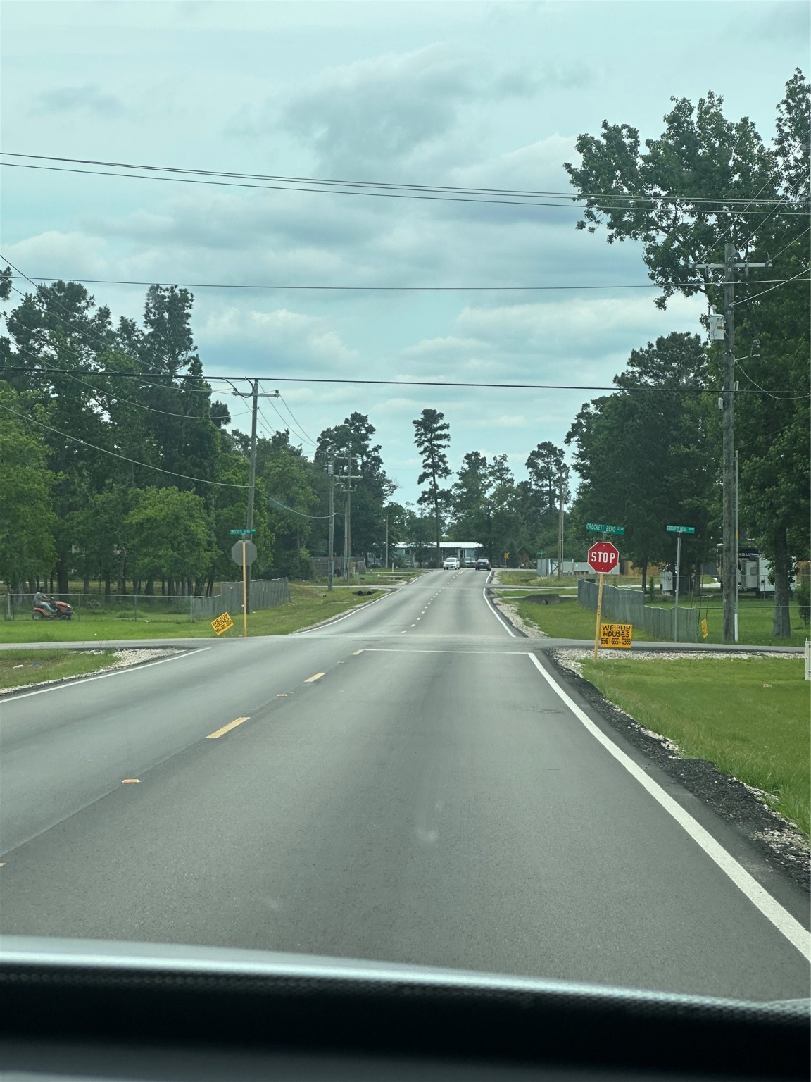 672 Wexford Drive Conroe, TX 77303 - Photo 5 of 10 a view of a swimming pool with a yard