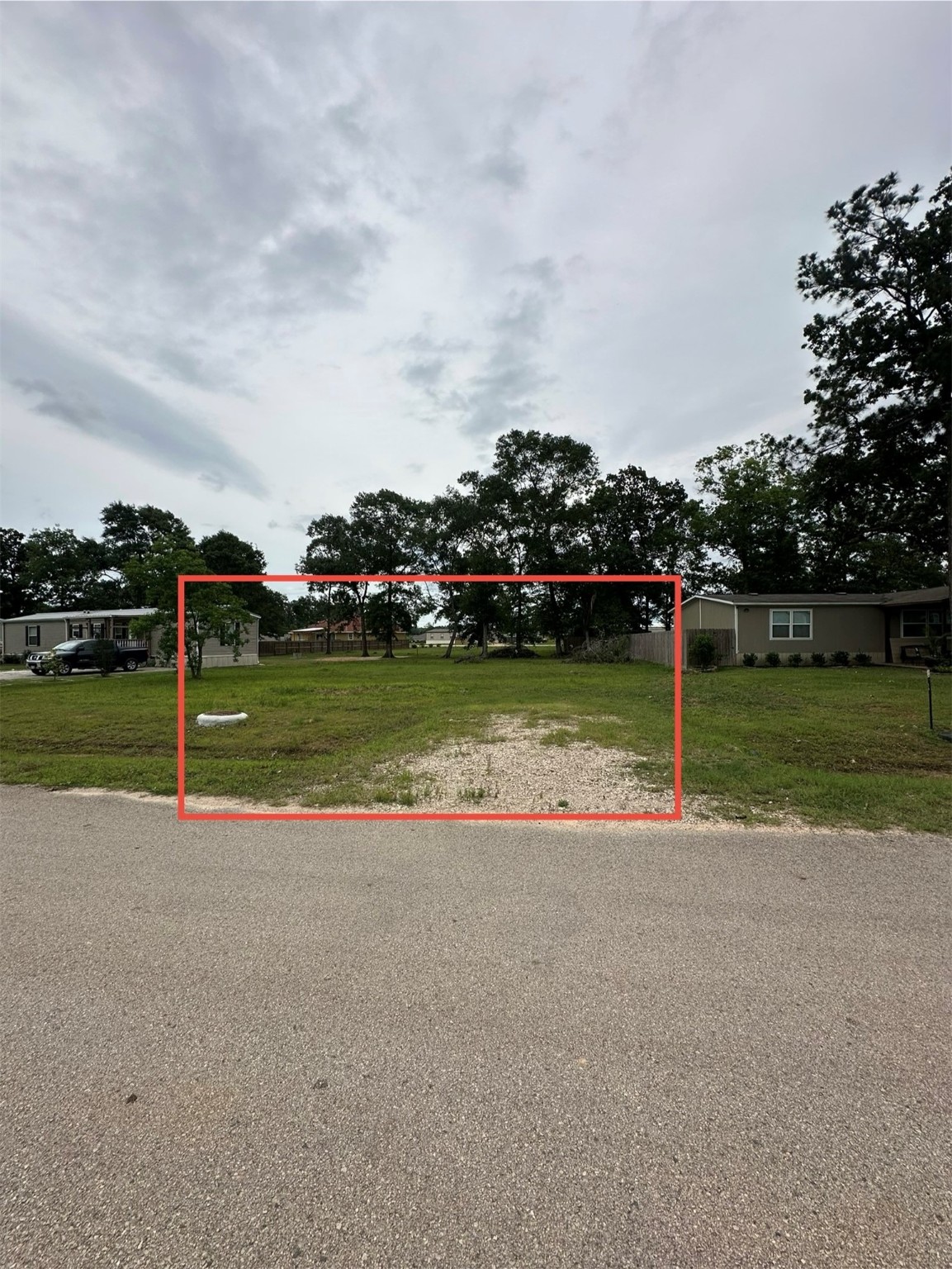 672 Wexford Drive Conroe, TX 77303 - Photo 6 of 10 a view of a lake with houses in back