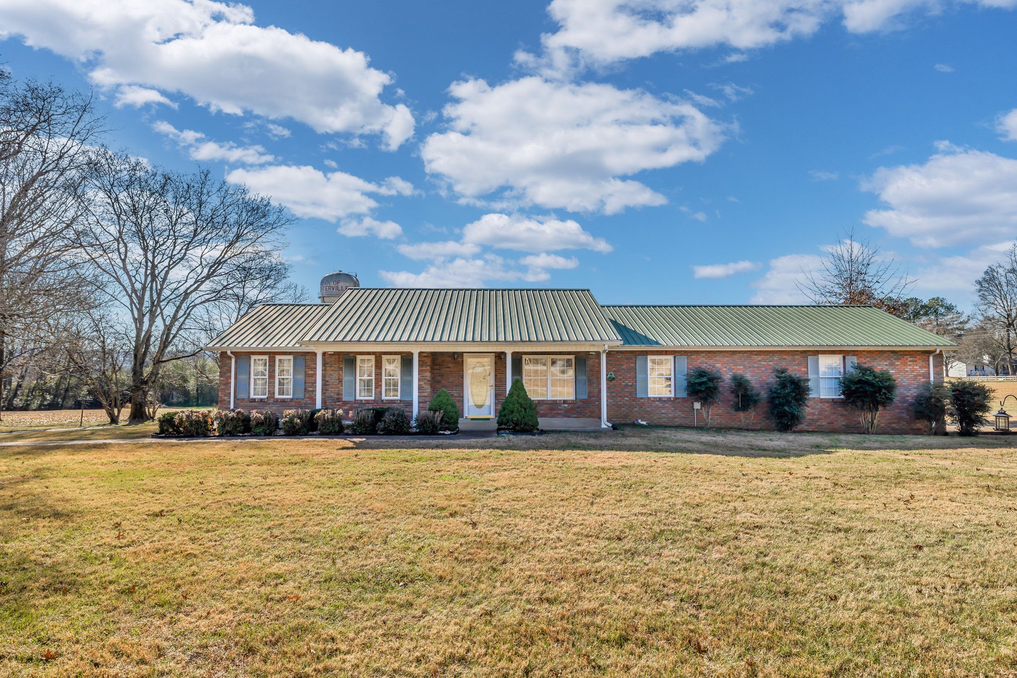 623 Highway 50 Centerville, TN 37033 - Photo 2 of 69 a front view of a house with a yard