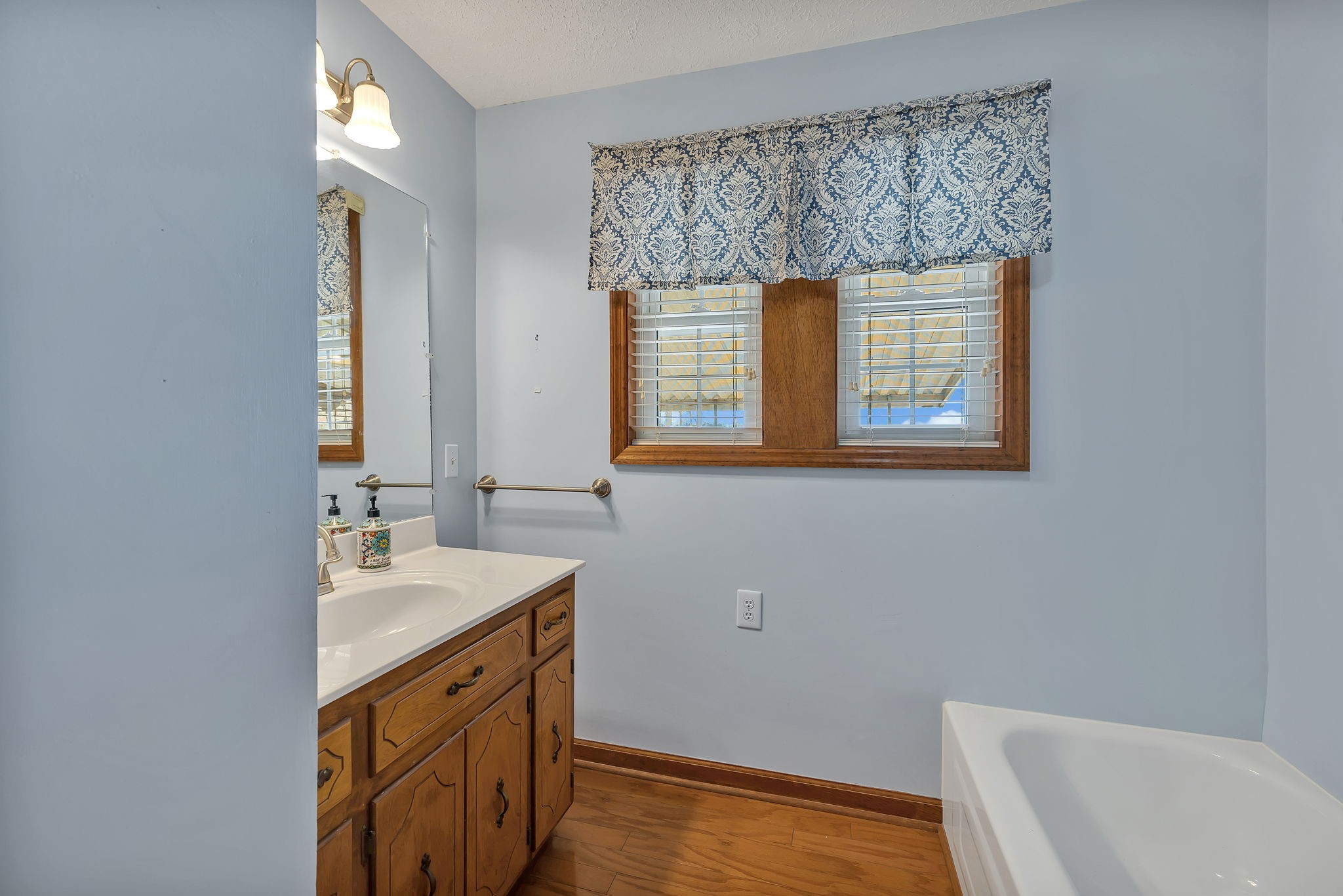623 Highway 50 Centerville, TN 37033 - Photo 24 of 69 a bathroom with a sink and a bathtub