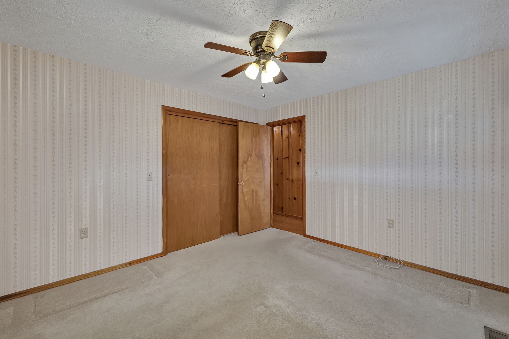 623 Highway 50 Centerville, TN 37033 - Photo 27 of 69 a view of an empty room with a ceiling fan