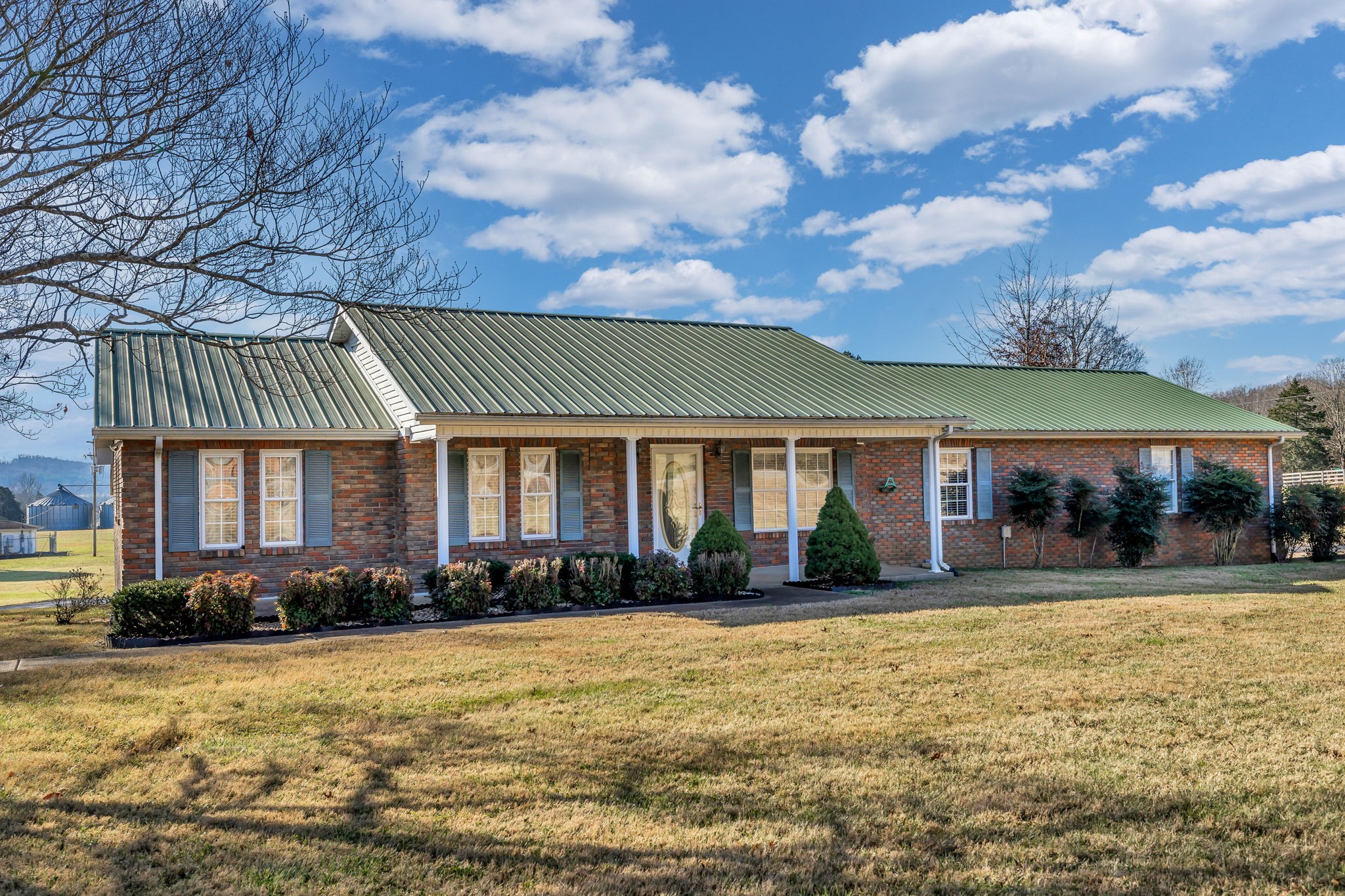 623 Highway 50 Centerville, TN 37033 - Photo 3 of 69 a front view of a house with a yard