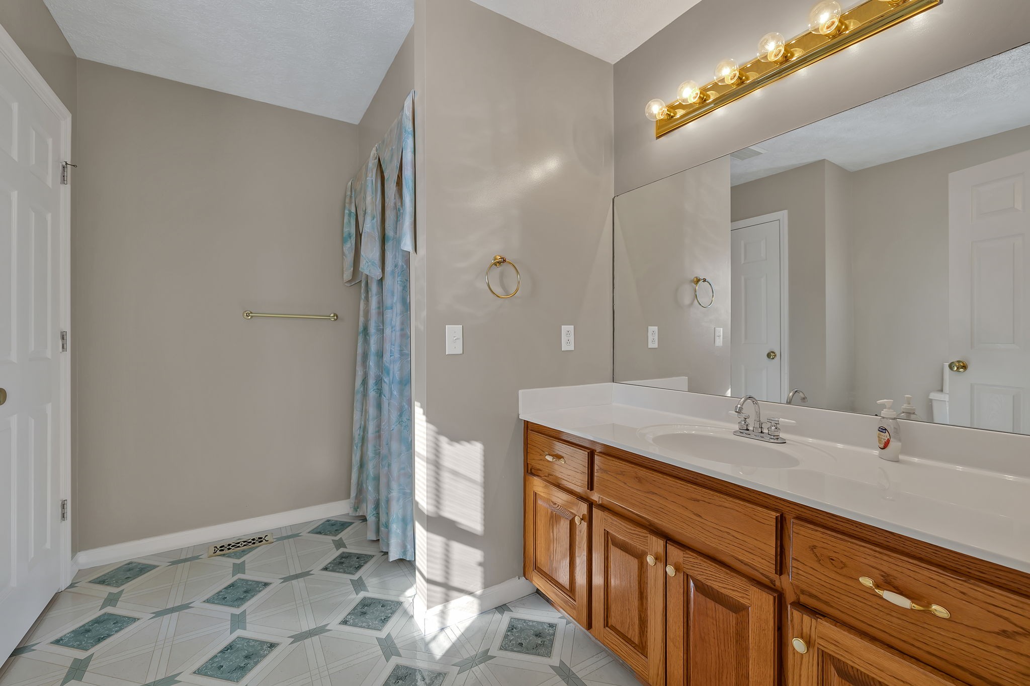 623 Highway 50 Centerville, TN 37033 - Photo 36 of 69 a spacious bathroom with a double vanity sink and a mirror