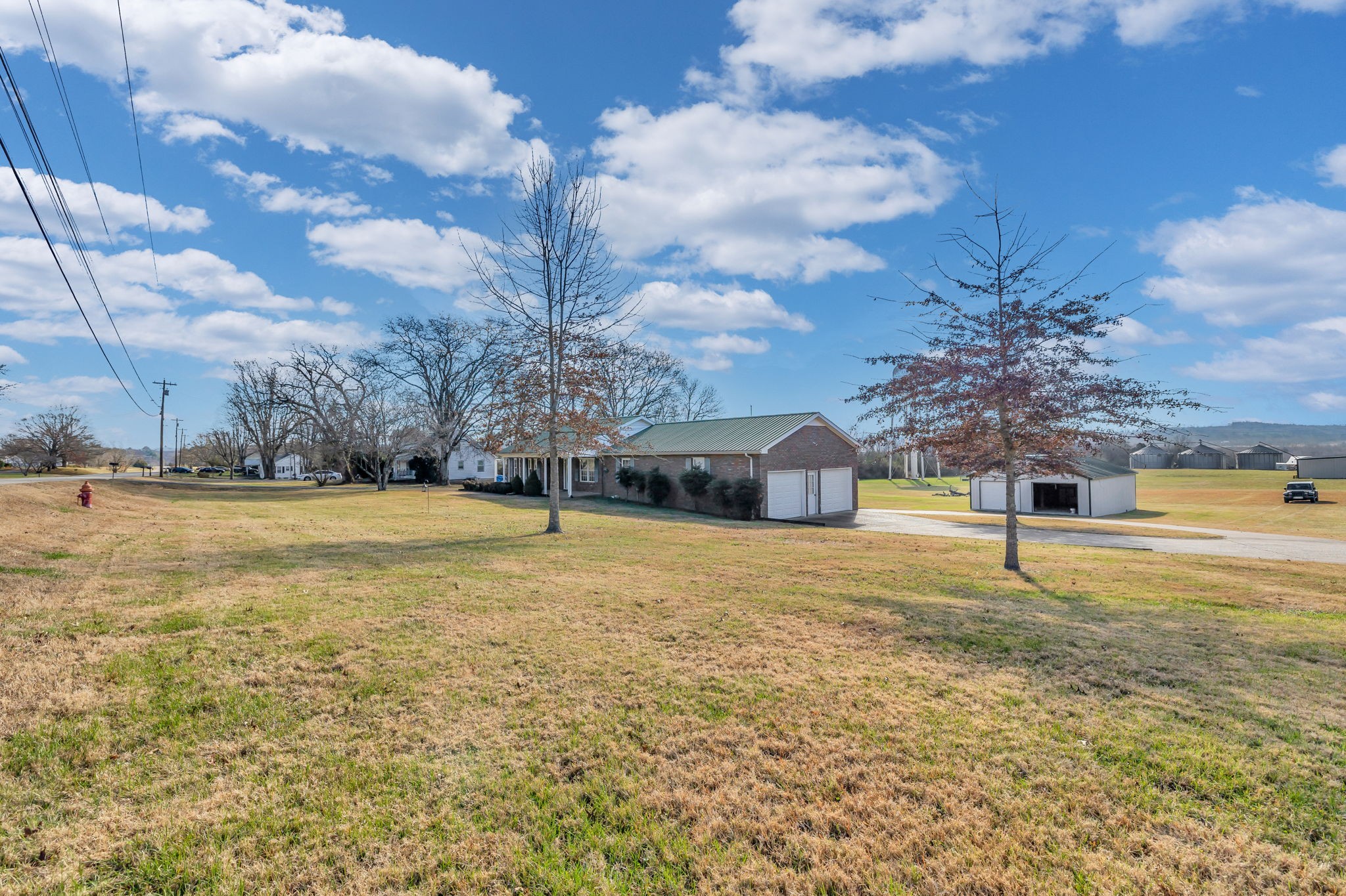 623 Highway 50 Centerville, TN 37033 - Photo 63 of 69 a house with pool in front of it