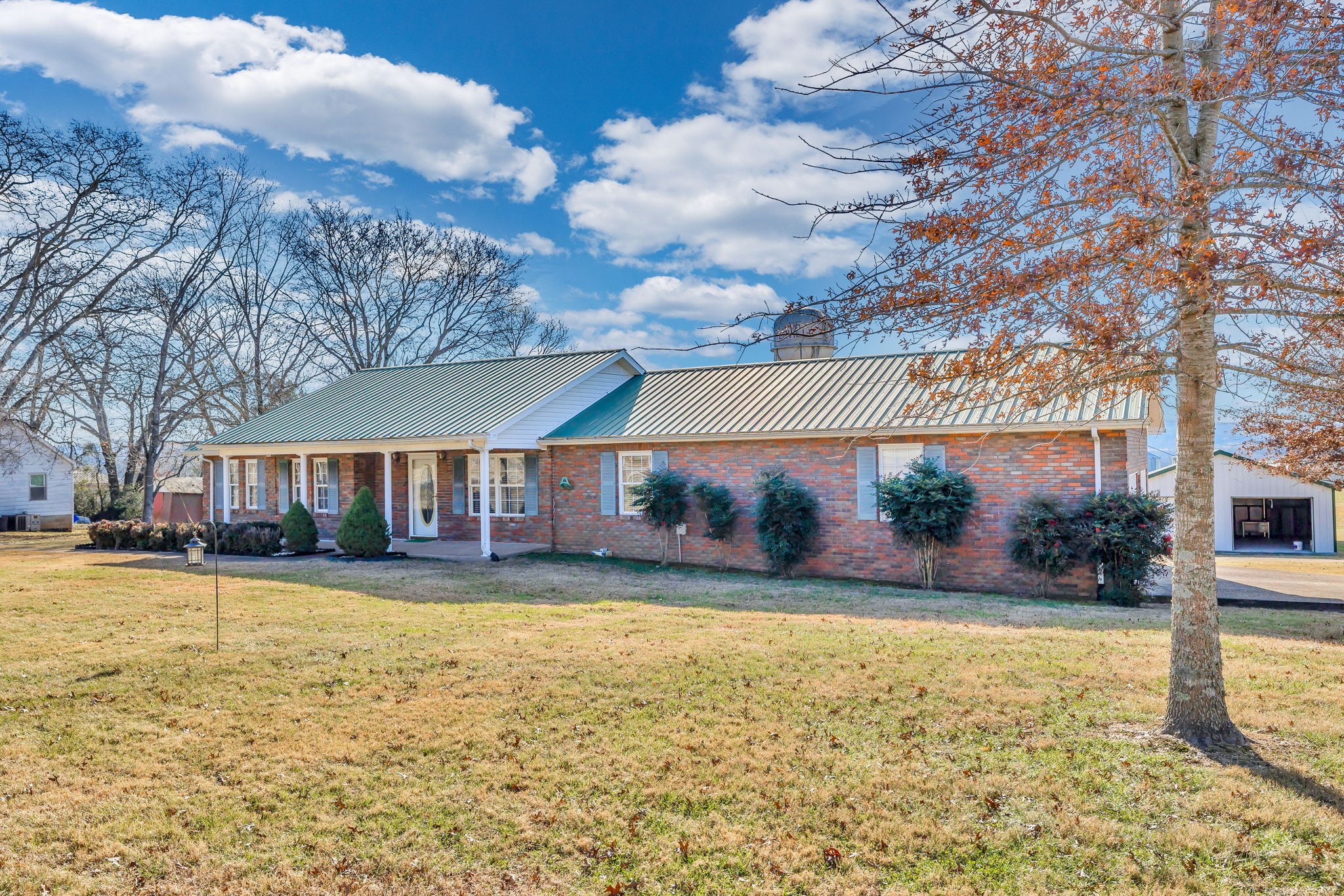 623 Highway 50 Centerville, TN 37033 - Photo 68 of 69 a view of a house with a yard and sitting area