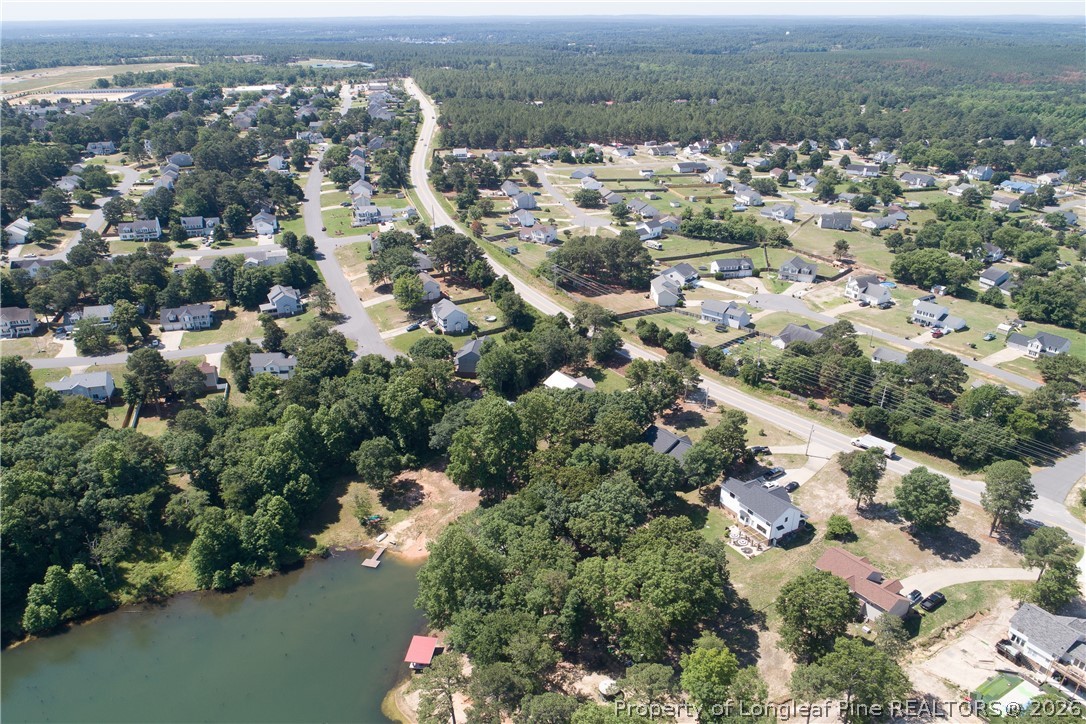 1075 Buffalo Lake Road Sanford, NC 27332 - Photo 47 of 49 an aerial view of a city with lots of residential buildings