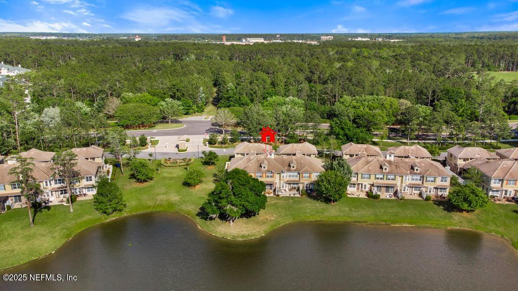 555 Hedgewood Drive St. Augustine, FL 32092 - Photo 51 of 70 an aerial view of residential houses with outdoor space and trees