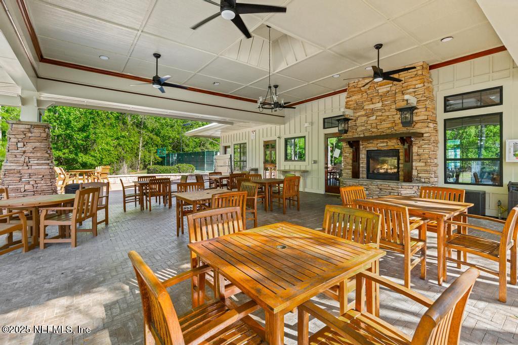 555 Hedgewood Drive St. Augustine, FL 32092 - Photo 56 of 70 a view of a dining room with furniture window and outside view