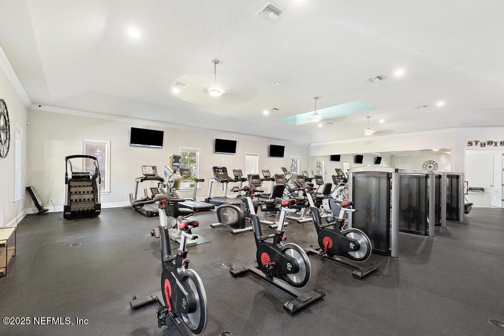 555 Hedgewood Drive St. Augustine, FL 32092 - Photo 57 of 70 a view of a room with gym equipment