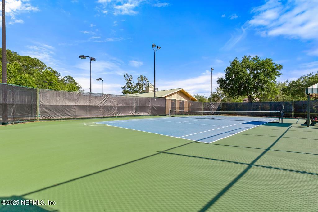 555 Hedgewood Drive St. Augustine, FL 32092 - Photo 63 of 70 a view of outdoor space and tennis court