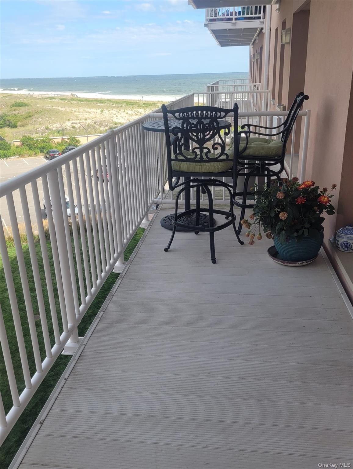 2 Richmond Road, Unit 4F Lido Beach, NY 11561 - Photo 8 of 27 a view of balcony with outdoor seating and city view