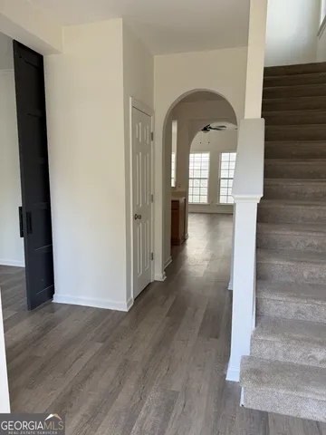 a view of entryway with wooden floor
