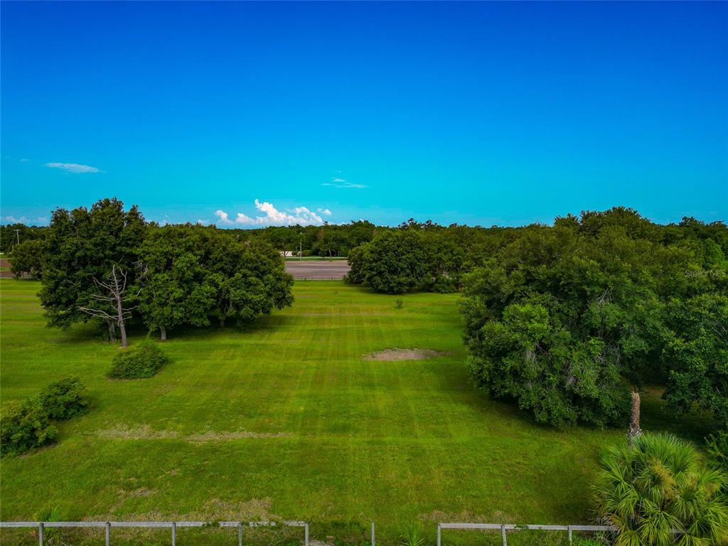 13210 Mulholland Road Parrish, FL 34219 - Photo 12 of 28 a view of an ocean and yard