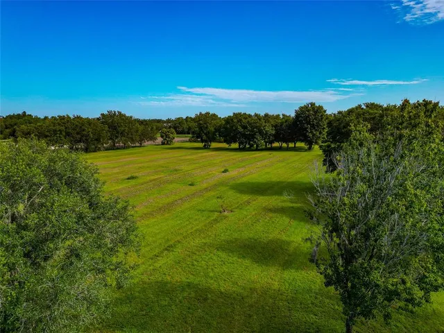 a view of a city with a big yard