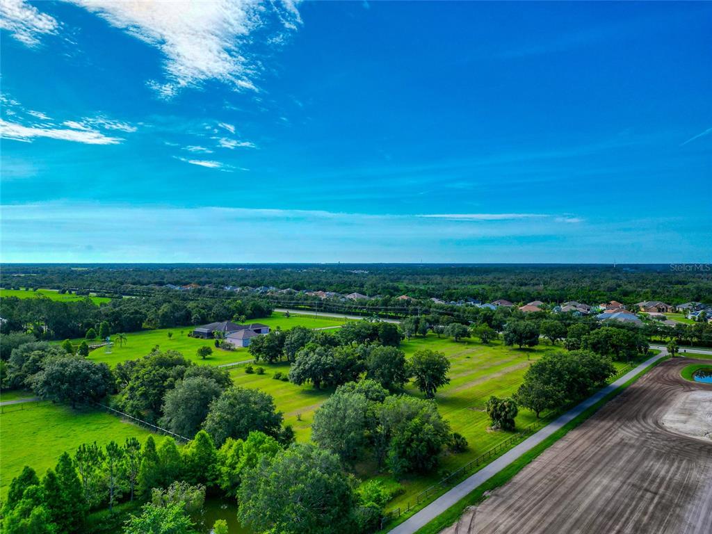 13210 Mulholland Road Parrish, FL 34219 - Photo 17 of 28 a view of a city from a balcony