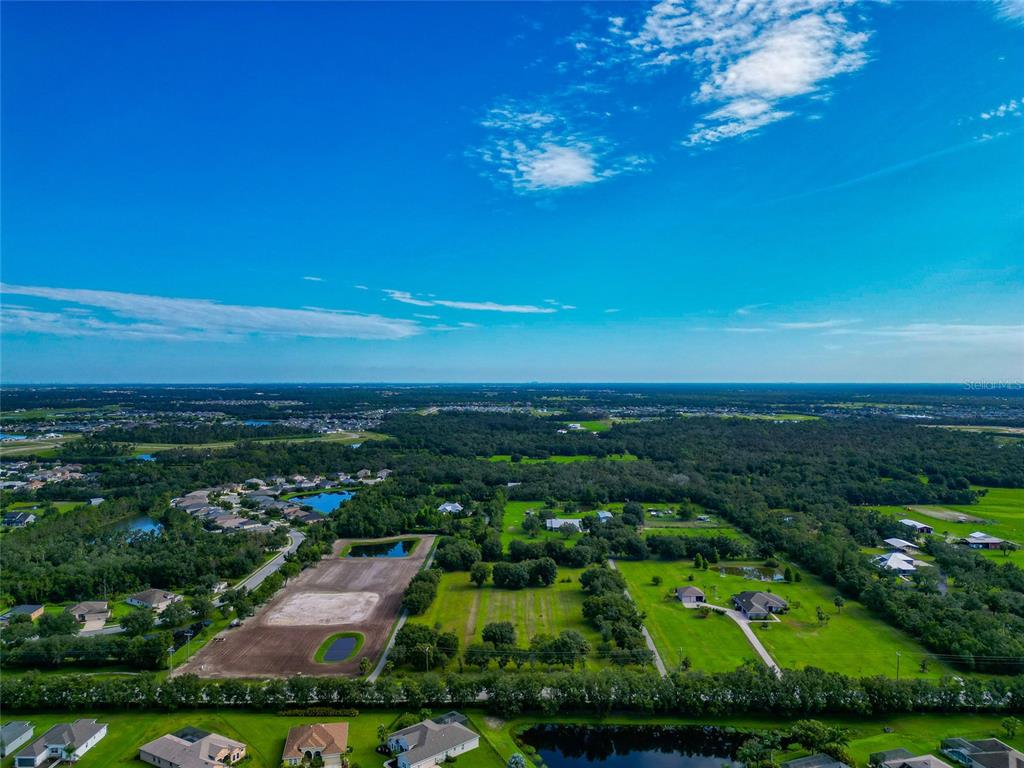 13210 Mulholland Road Parrish, FL 34219 - Photo 18 of 28 an aerial view of a city
