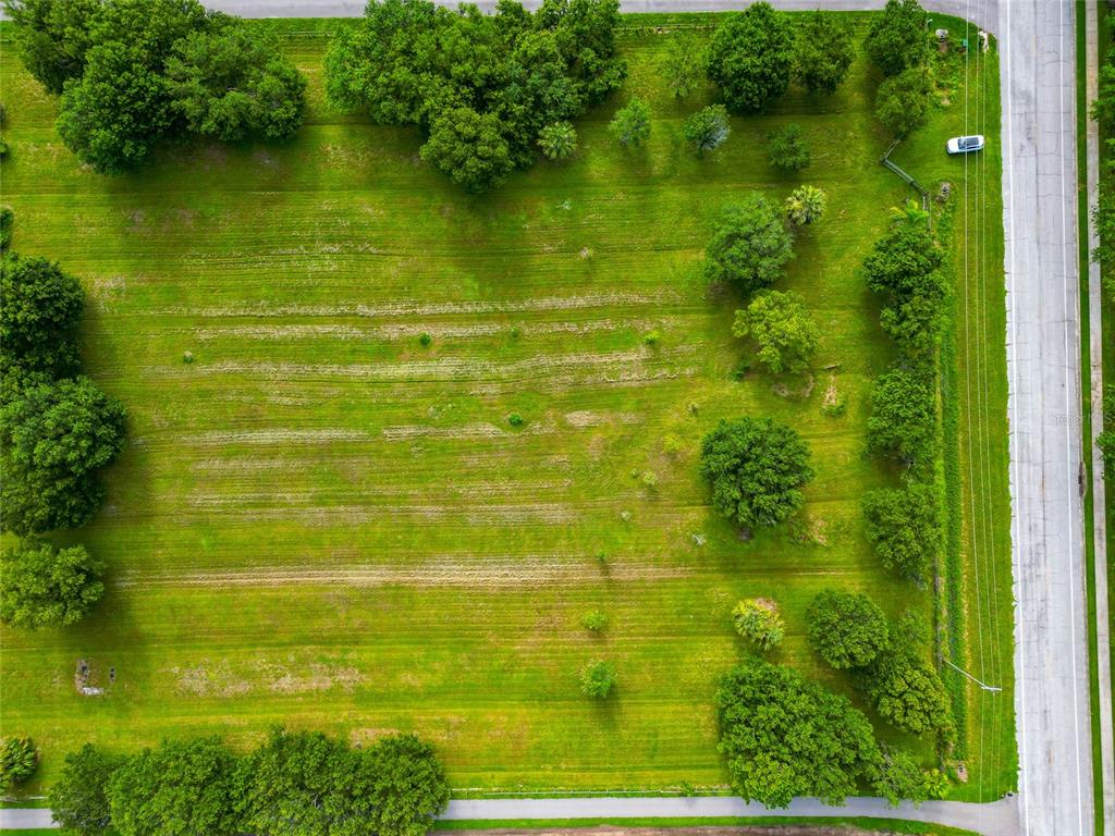 13210 Mulholland Road Parrish, FL 34219 - Photo 2 of 28 a view of a lake view