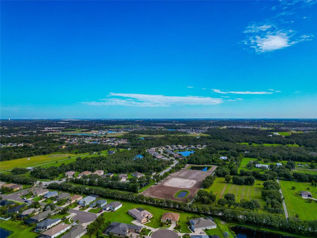 13210 Mulholland Road Parrish, FL 34219 - Photo 22 of 28 a view of city and ocean
