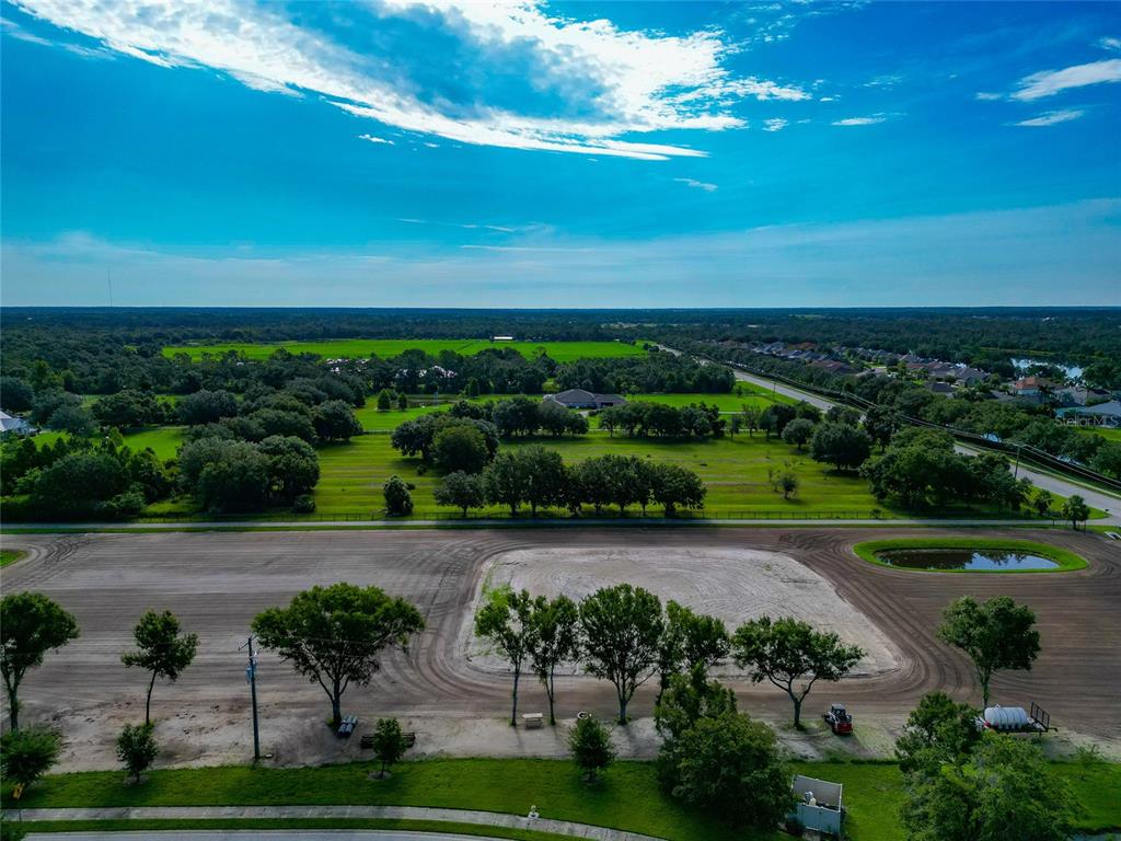 13210 Mulholland Road Parrish, FL 34219 - Photo 24 of 28 an aerial view of a city