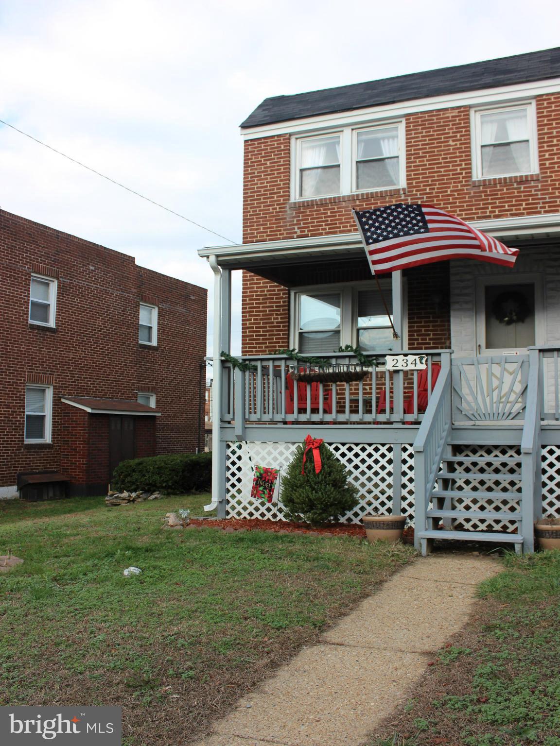 234 Arden Road West Baltimore, MD 21225 - Photo 1 of 26 a front view of a house with garden