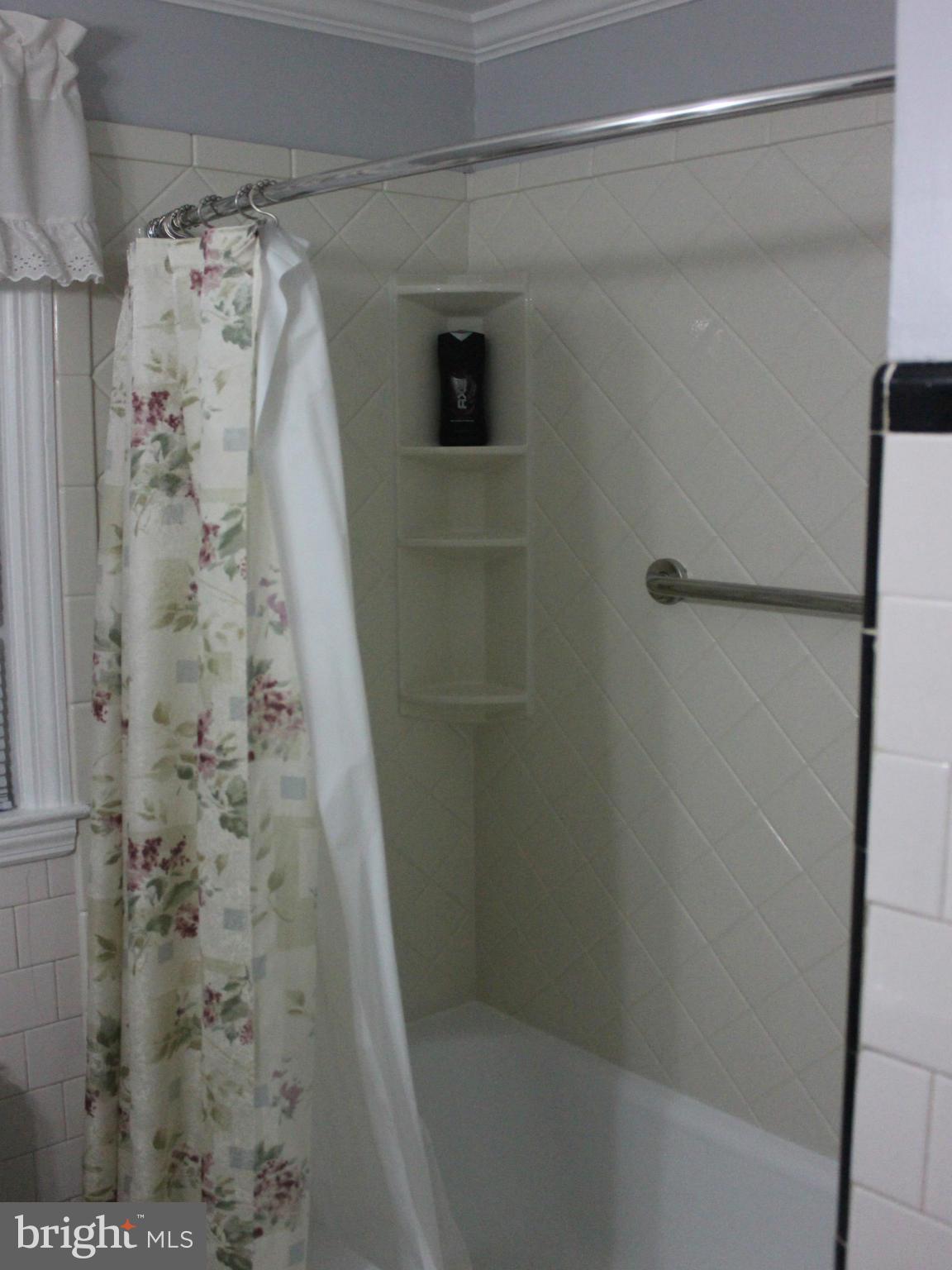 234 Arden Road West Baltimore, MD 21225 - Photo 17 of 26 a bathroom with a shower