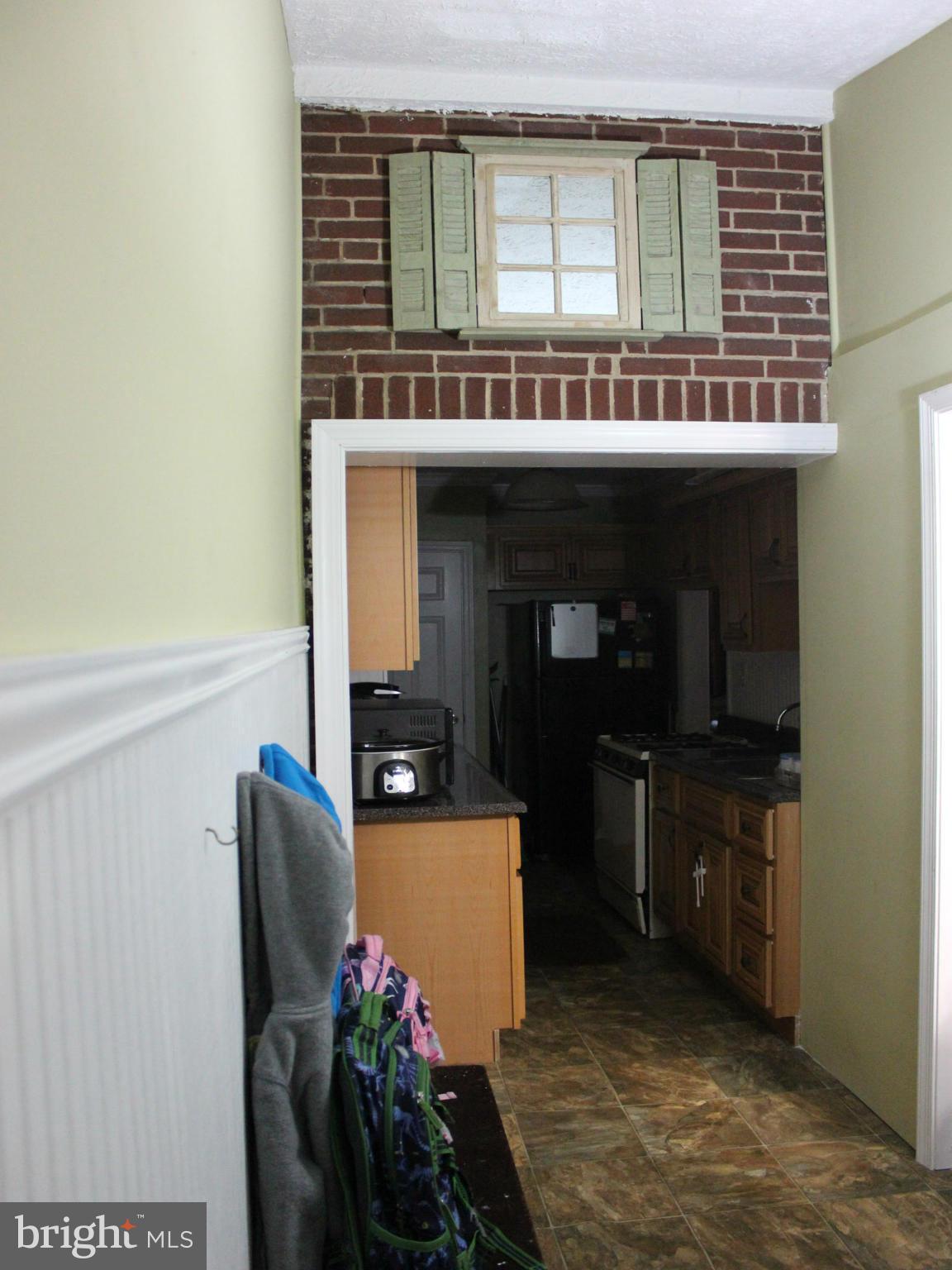 234 Arden Road West Baltimore, MD 21225 - Photo 3 of 26 a living room with furniture and a window