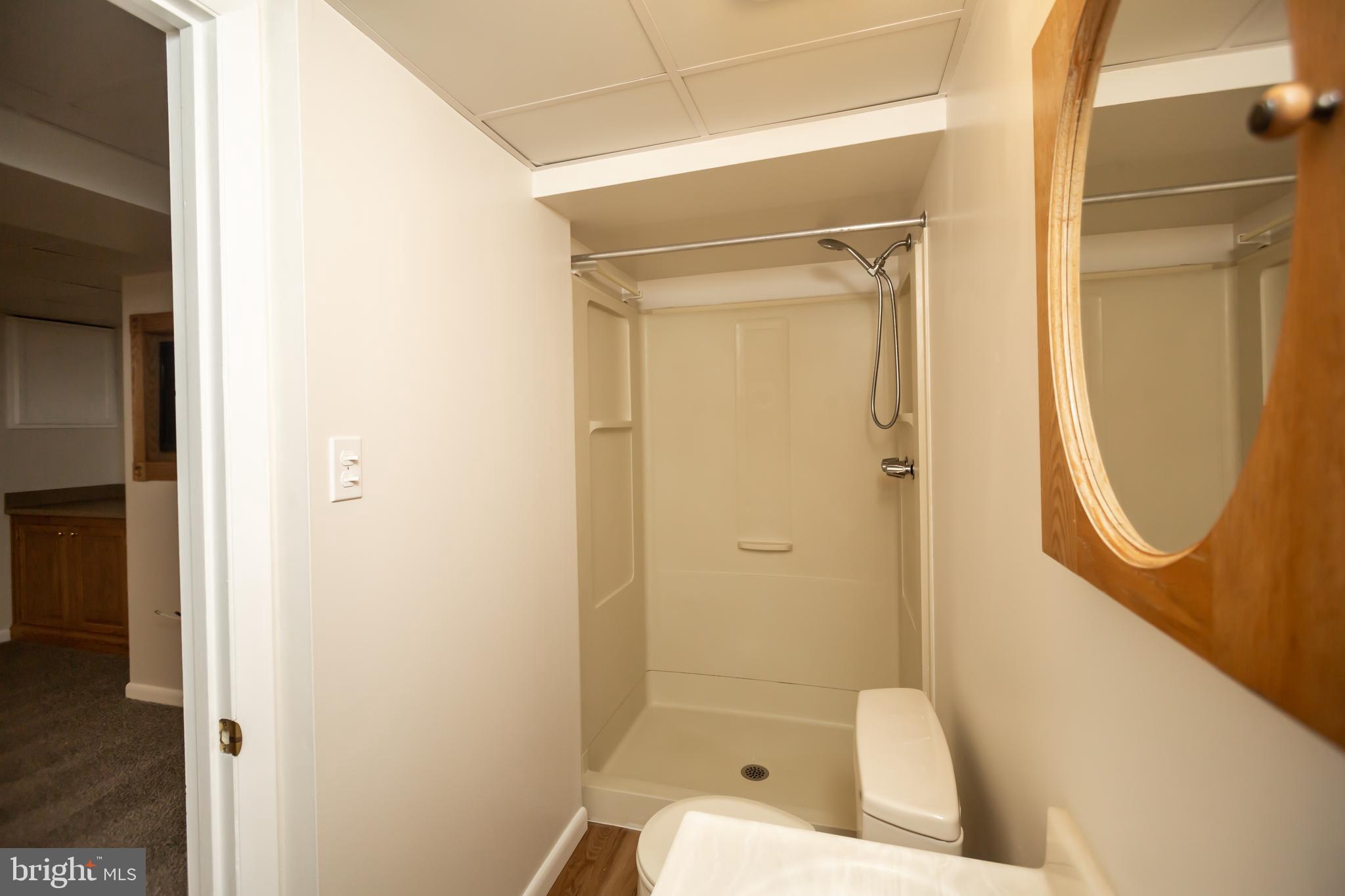 11623 Rivershore Drive Dunkirk, MD 20754 - Photo 40 of 49 a bathroom with a toilet and shower